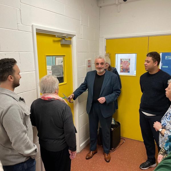 Photo of MP Tommy Sheppard opening the refillery.