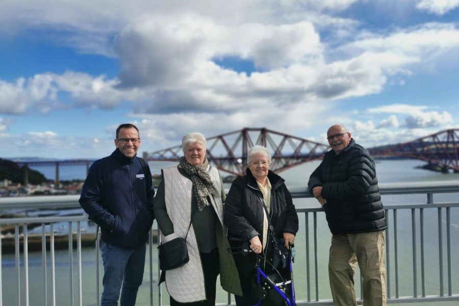 Photo of tenants on the Forth Road Bridge with the Forth Rail Bridge in the background.