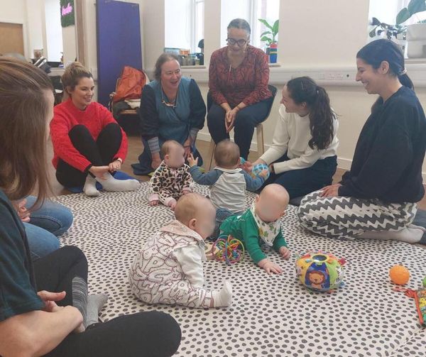 Photo of parents and babies at Kin Collective.