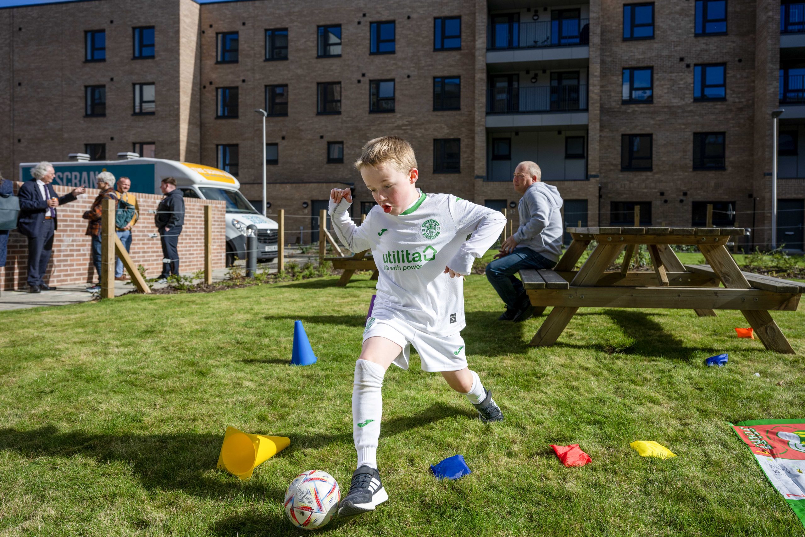 Photo of a young boy playing football.
