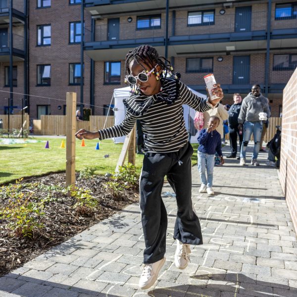 Photo of a girl playing hop scotch.