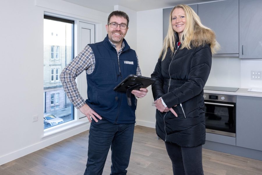 Harbour staff members pictured in the new homes at Iona Street