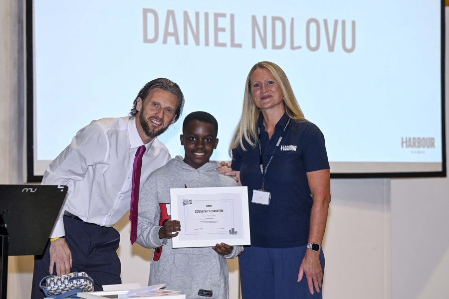 Photo of Daniel Ndlovu receiving his award.