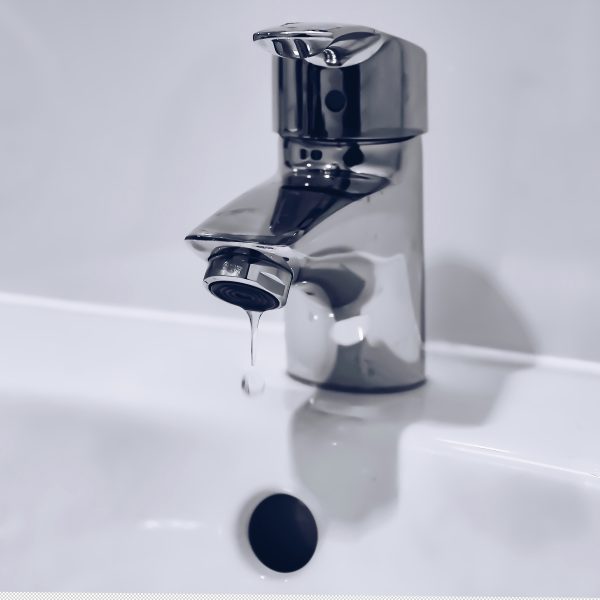 Photo of a dripping tap.