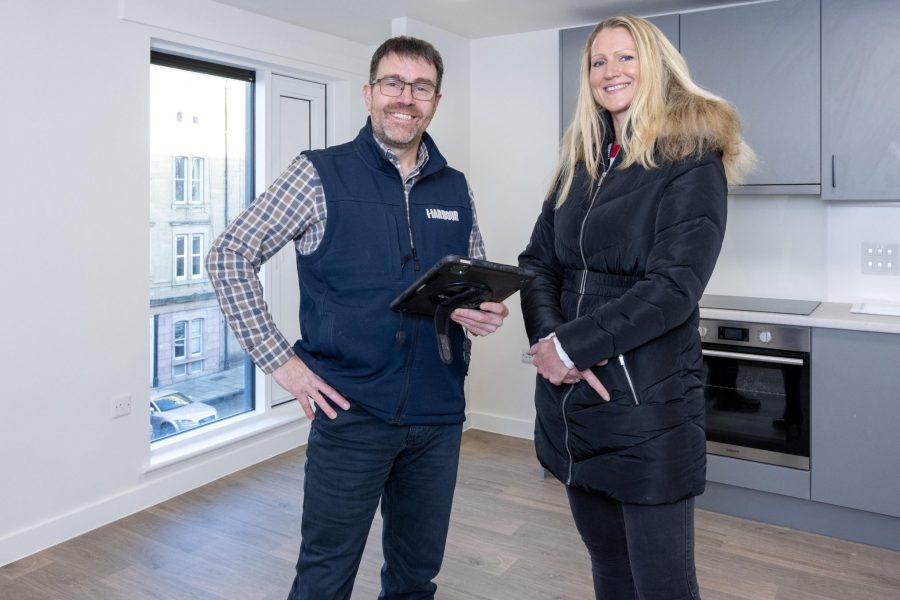 Harbour staff members pictured in the new homes at Iona Street